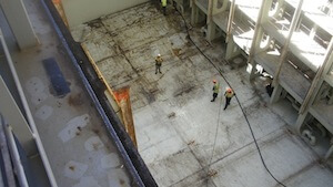 Emergency Oil Spill Clean-Up — Crew responding inside a vessel to a contained oil spill.